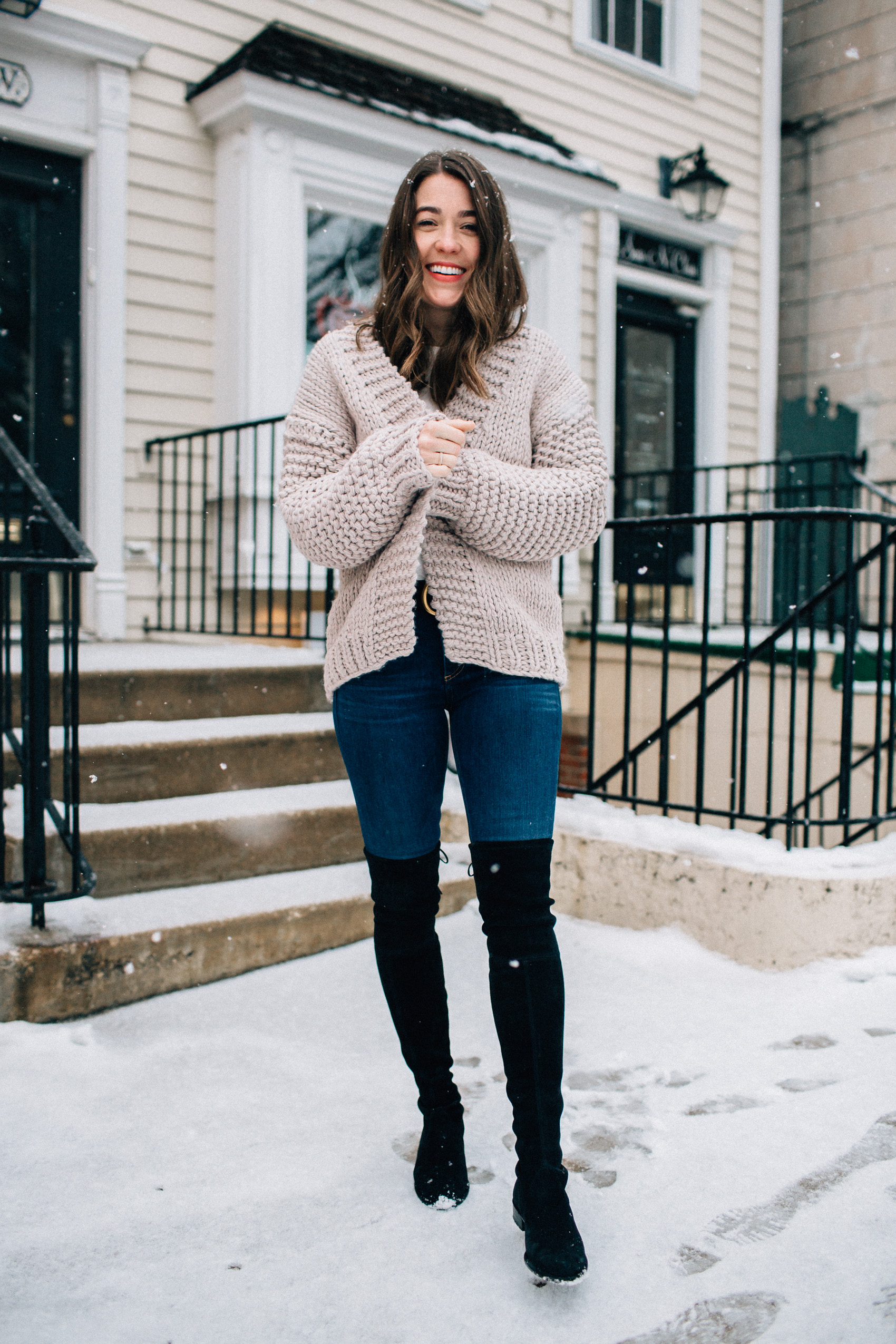 valentine's day casual outfit blue jeans gucci belt black stuart weitzman over the knee boots