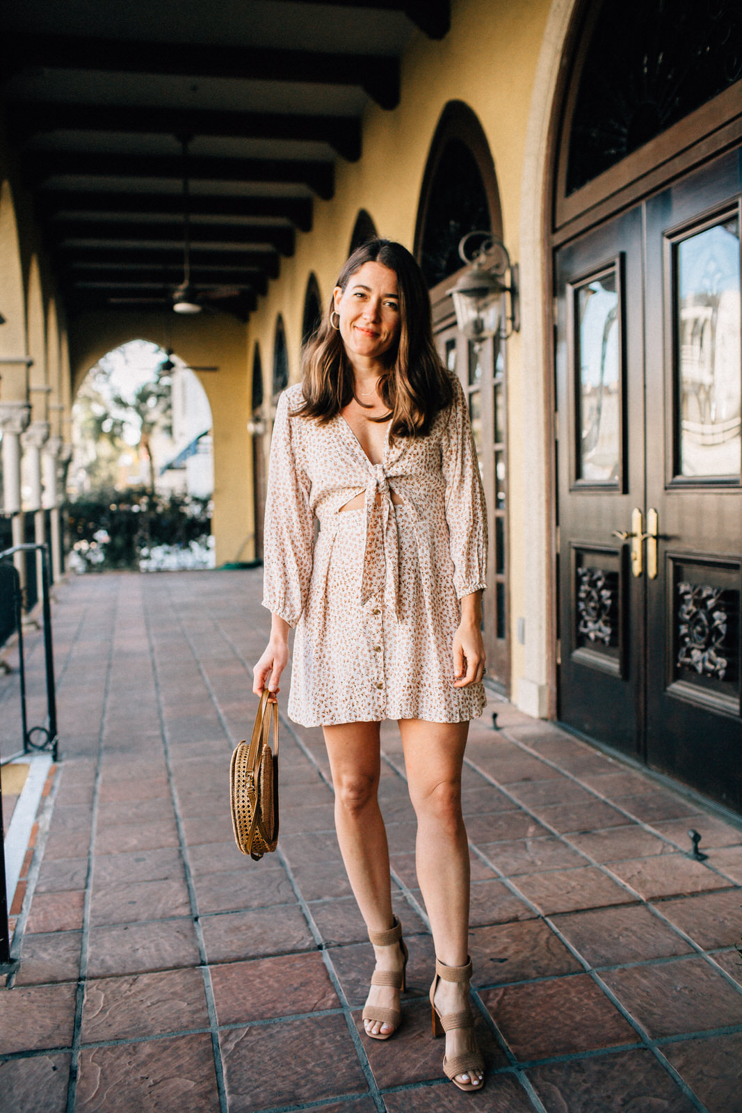 vacation date night outfit in naples florida wearing faithfull the brand trinidad dress serpui marie wicker handbag