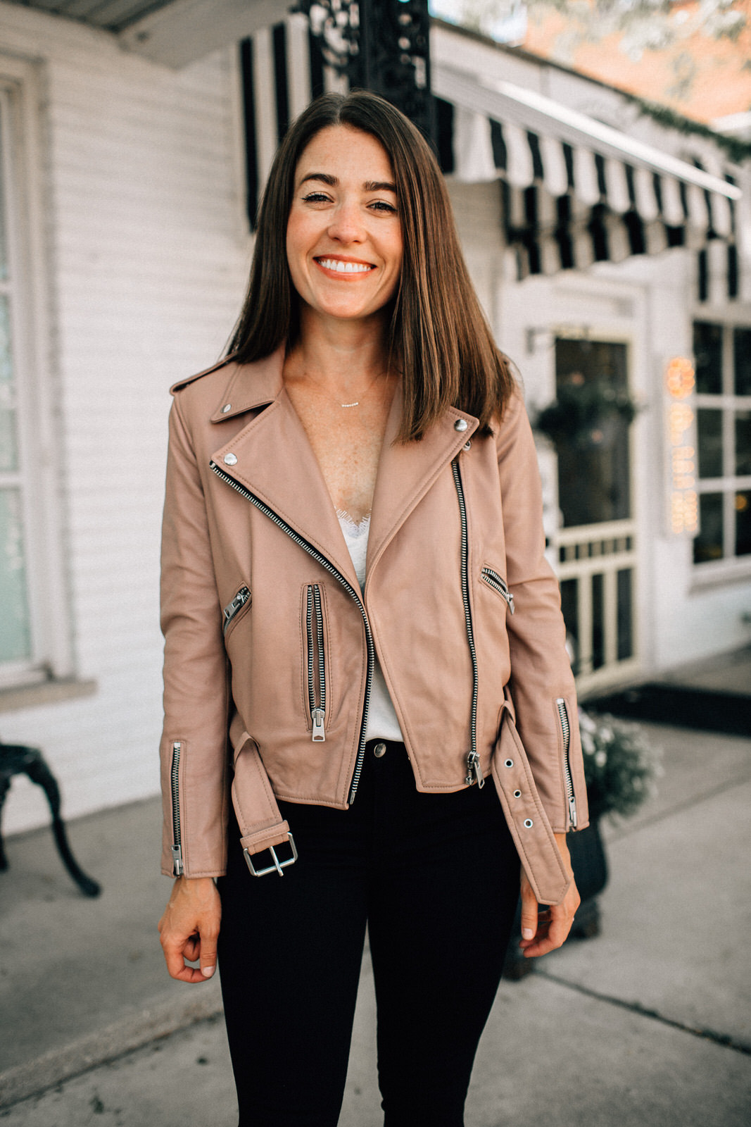 nordstrom anniversary sale outfit allsaints leather jacket white lace cami rag & bone jeans