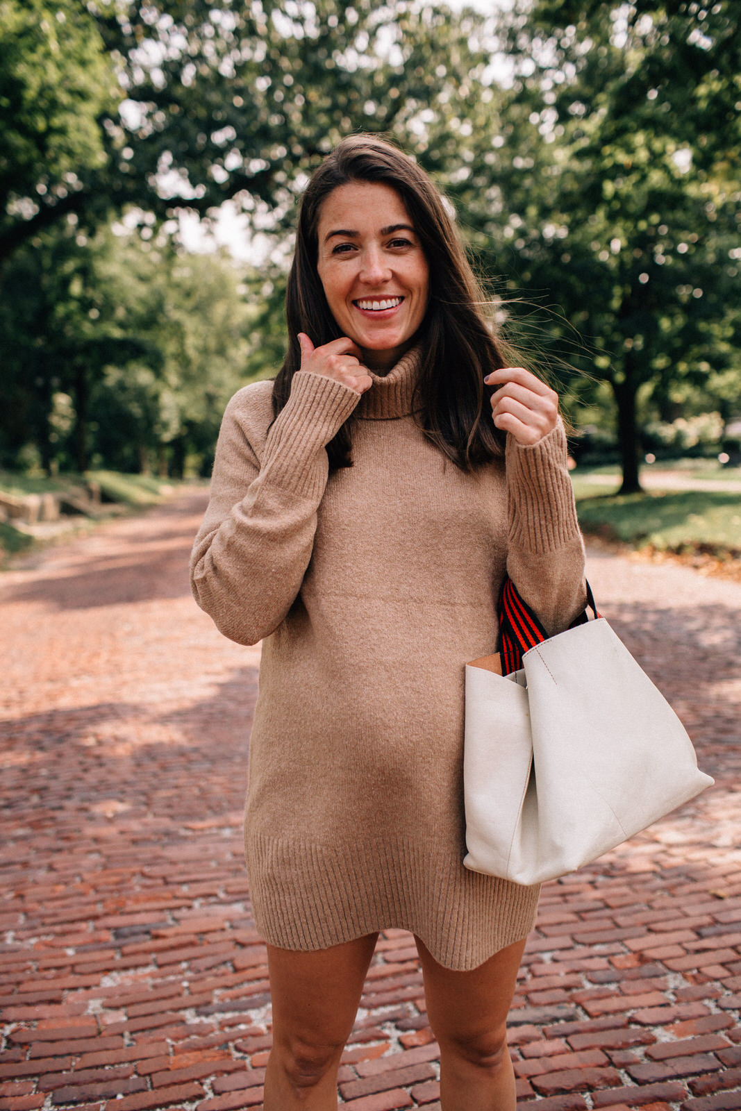 Liz Adams wearing sweater dress for fall from Amazon with Clare V. leather tote and Golden Goose sneakers how to style sweater dresses for fall